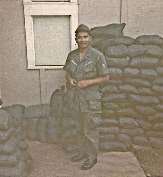 Vasquez stands at base in Vietnam during his deployment. Vasquez served for 20 years from 1957-1977.