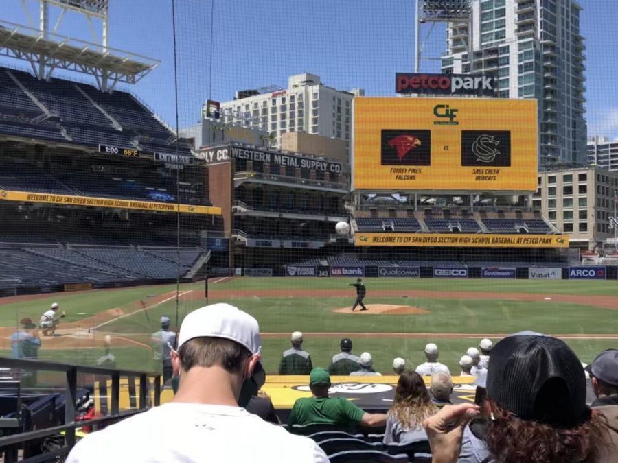 Principal Schuveiller throwing the first pitch at the CIF qualification baseball game between Sage Creek and Torrey Pines. For the teen baseball players, it was a once-in-a-lifetime opportunity to play at a professional baseball field, Petco Park. 