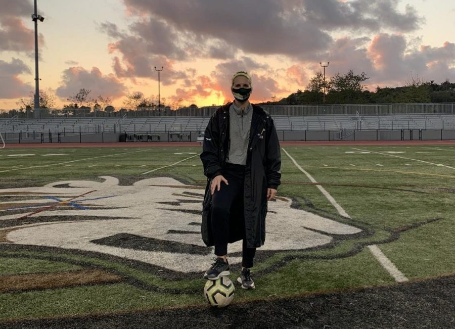 Coach Madison McLean poses in the Bobcat Arena following a practice with her team. Mclean, a mathematics teacher took the role of Varsity girls soccer coach in 2021 propelling a team to a league championship and a CIF. 