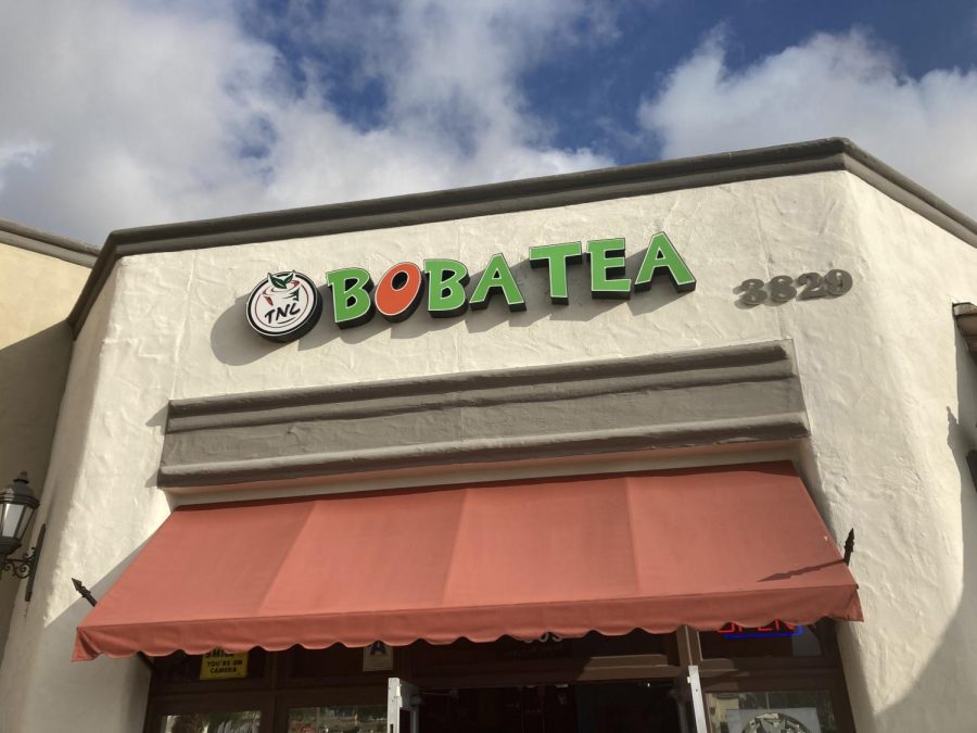 TNL Boba’s front entrance, decorated with their logo of colorful lettering. TNL Boba is located at 3829 Plaza Dr #605, Oceanside, CA 92056.