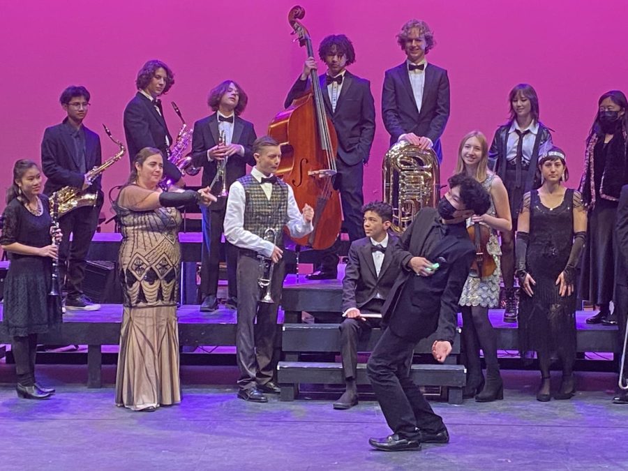 Music Director Juliana Quiñones reenacts a "Chicago" murder with Student Music Director Thomas Lien. The musical's chamber orchestra provided live music throughout the entire show and transported their audience. 