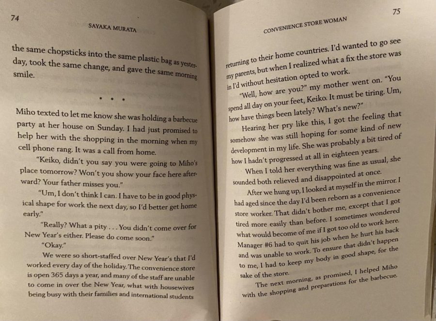 The novel ‘Convenience Store Woman’ is open to a page near the middle of the story. The contents of the novel is told from the point of view of Furukura and often dives into her frustrations and differences from those around her.