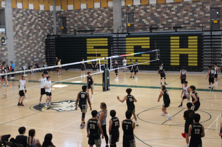 A Sage Creek volleyball player blocks the ball from the Carlsbad volleyball player who hit the ball. Sage Creek’s boys Novice A Volleyball team played Carlsbad at home on Thursday and beat Carlsbad with a score of 13-15. 