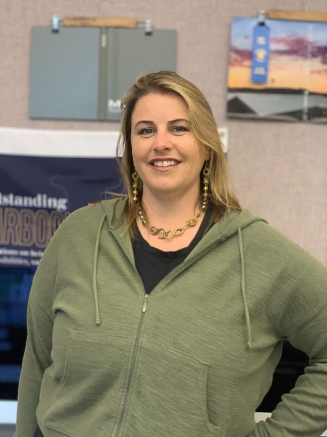 Yearbook Advisor and English 2 teacher Melissa Barry poses in her classroom. Barry is going on to become the Vice Principal at Aviara Oaks Middle School. 