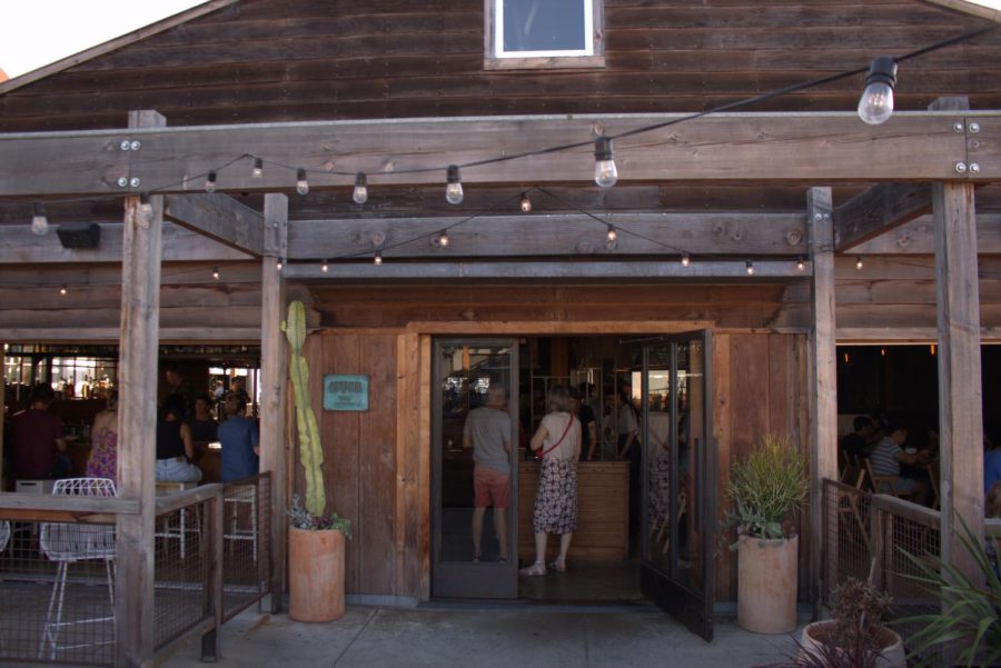 Guests are greeted at the hostess stand. The restaurant opens at 5 p.m. every day except on Tuesdays; Campfire is closed on Tuesdays.