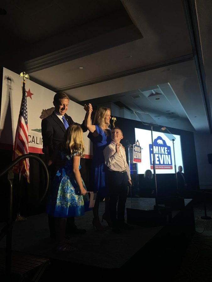 Incumbent Rep. Mike Levin for District 49 celebrates election night with his family at the Hilton San Diego. Levin hosted an election night party to celebrate the work of his team and his lead in the race.