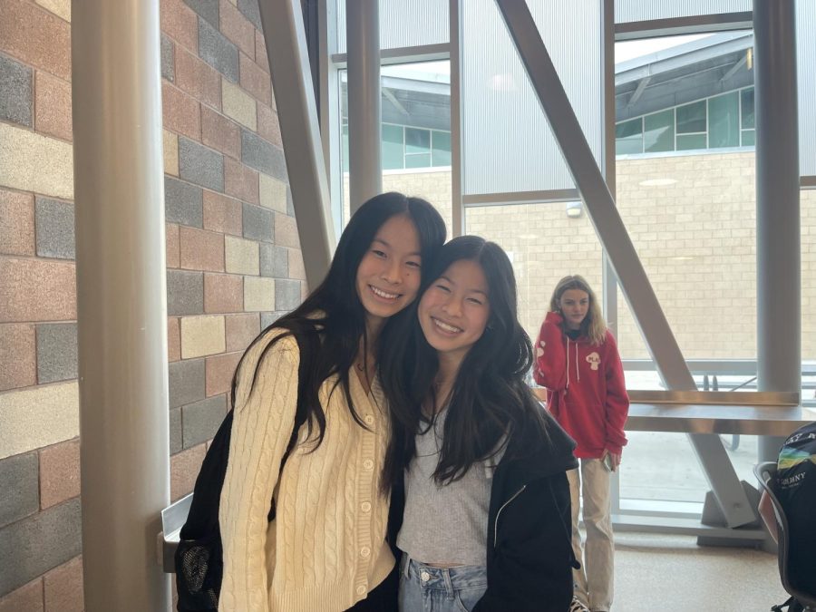 Sisters Chloe and Elise Lu smile. The two were paired together on Monday, January 9.