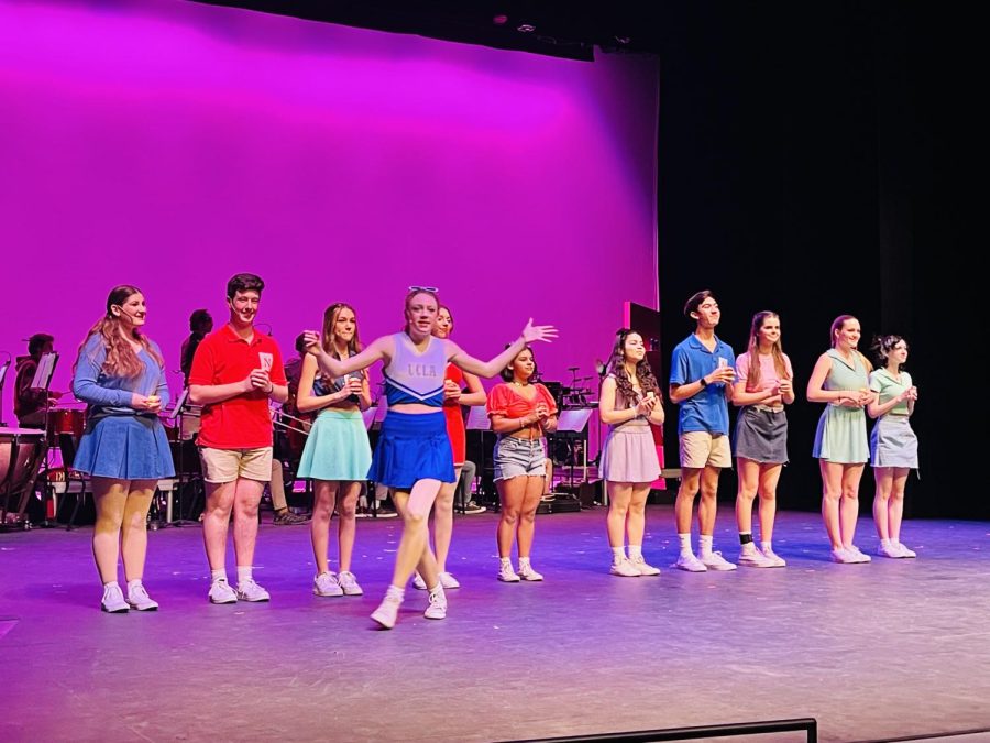 Elle, Serena, Margot, Pilar and the Delta Nu Sisters perform. In Act 1 of the Legally Blonde musical, the actors and actresses sing the opening song, “Omigod You Guys."