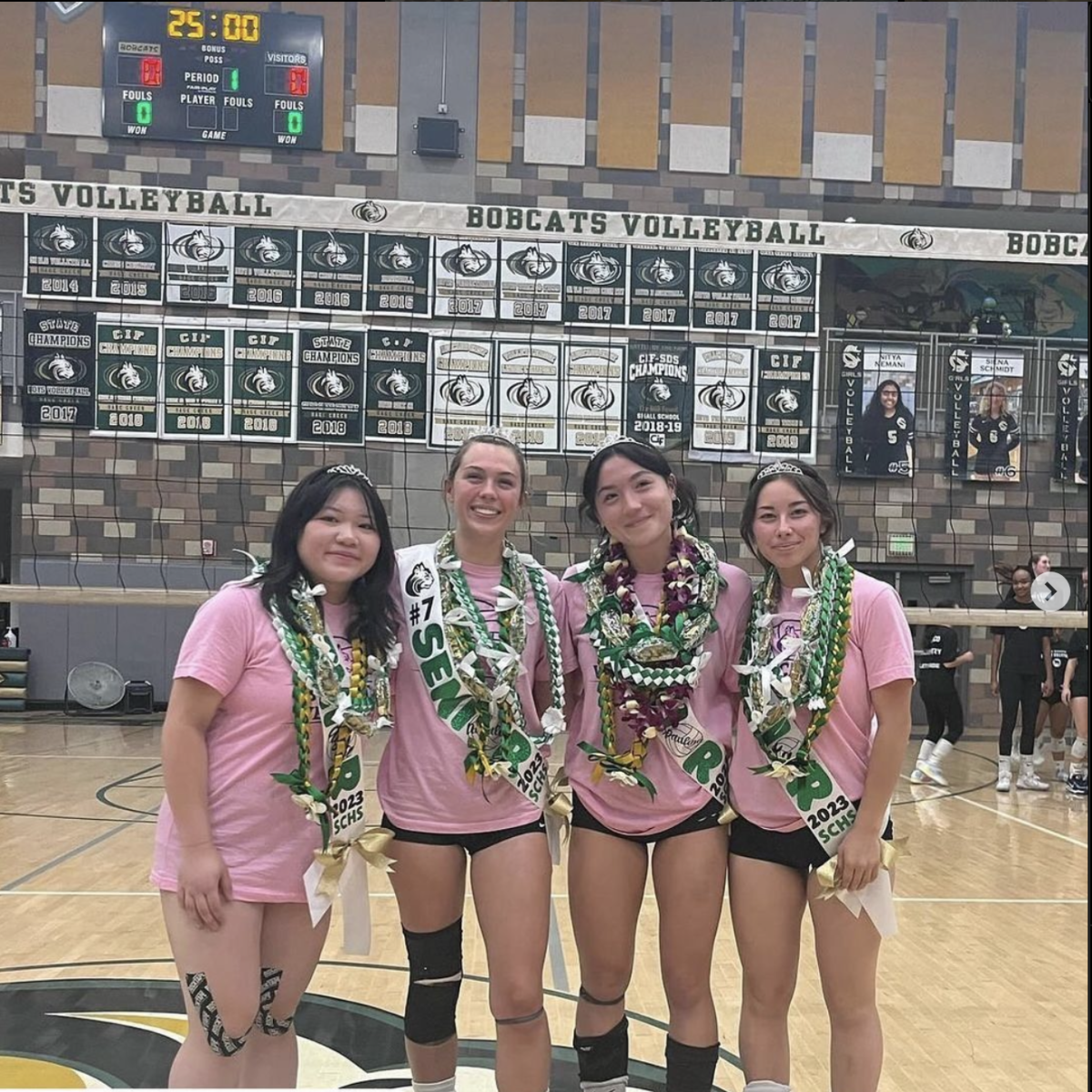 Natalie Steele, Paulina Baillie, Ayla Yasukochi and Kaia Ross are shown standing together for senior night photos. 