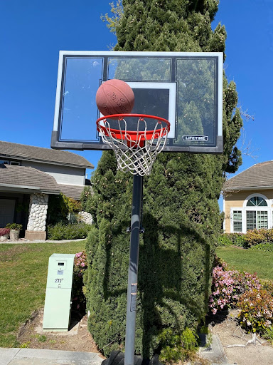 A basketball is being shot into the hoop.  Students and Staff will have less time to aim their shot.