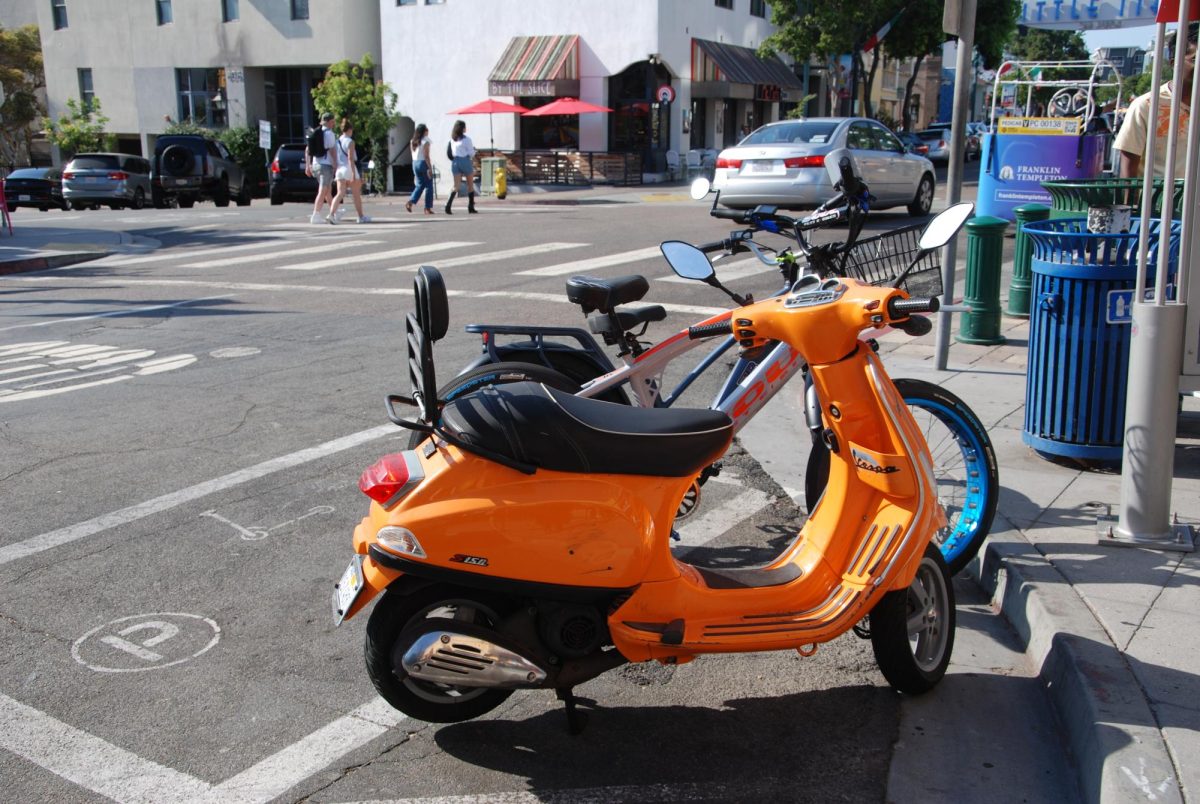 Little Italy has a variety of motor vehicles used for transportation by residents. Popular in Spain, the Vespa (seen here) was invented in 1946.