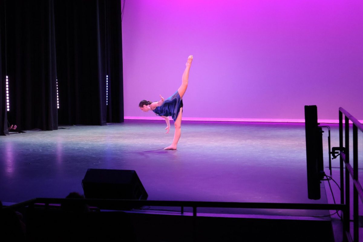 Senior Company dancer Lacy Clemons performs a solo dance she choreographed herself. All graduating seniors in the Dance Company performed a solo dance where they decided the song and the choreography.
