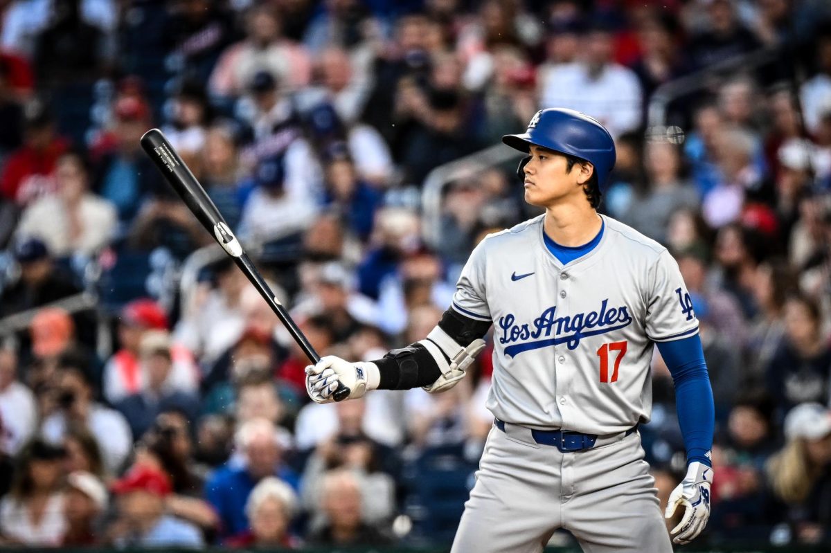 Dodgers star Shohei Ohtani stepping into the batters box. He is focusing on his breathing and
relaxing.