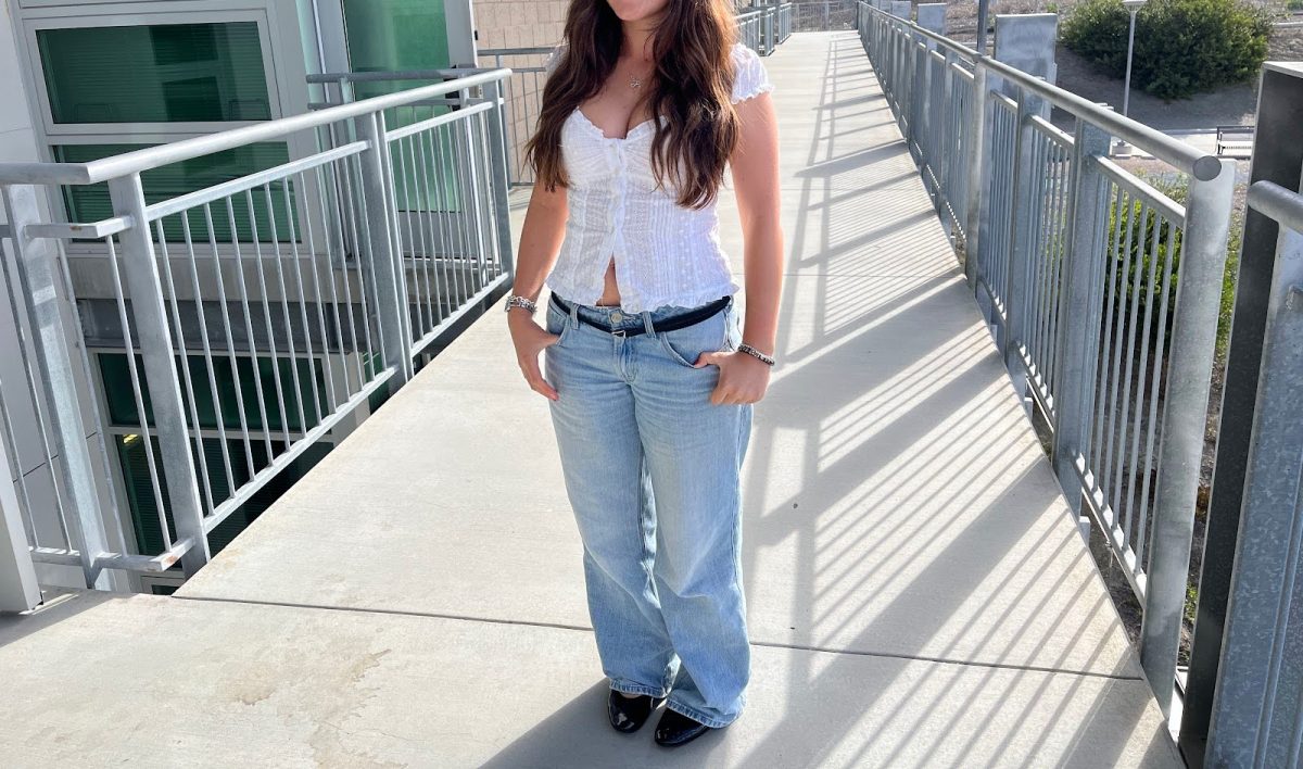 Izzi Gerencher portrays a “clean girl” aesthetic. The look includes light colors and a stylish top. 