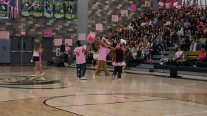 Sage Creek hosts its first pep rally in fall 2025 to honor fall accomplishments and raise awareness for breast cancer. Students and staff dress in pink to support the cause.