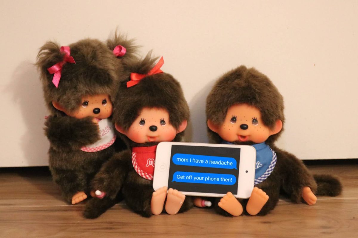 Three Monchichi babies gather together holding an iPod with an average text conversation with their mother depicted on the screen. Social media is not only a source of entertainment, but it is also a source for research and knowledge.
