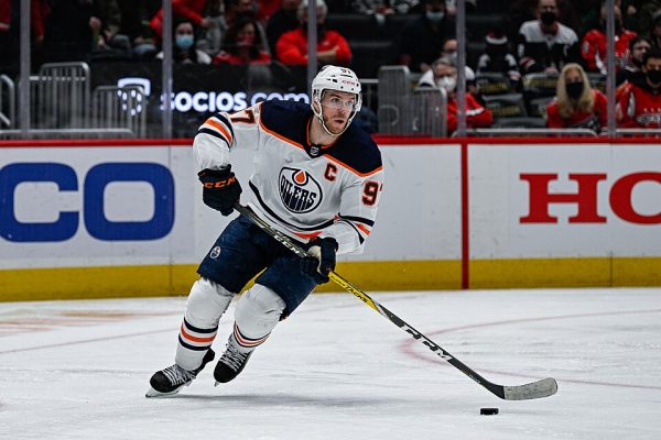 Connor McDavid skates with the puck. He is a contender for the MVP award.