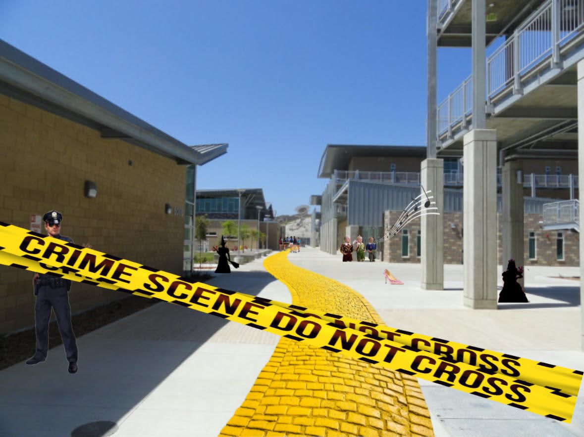 Police block off the entrance to school as official yellow tape stretches across the scene. Students gather to follow a strange yellow road to find the mystery at the end. 
