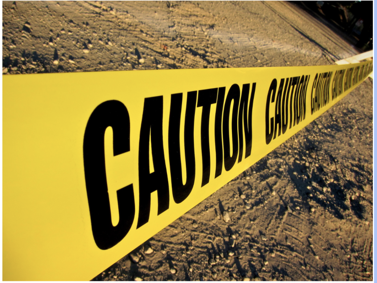 Crime scene blocks access to a potential crime scene. Highlighting the real events that often become the focus of true crime media. 
